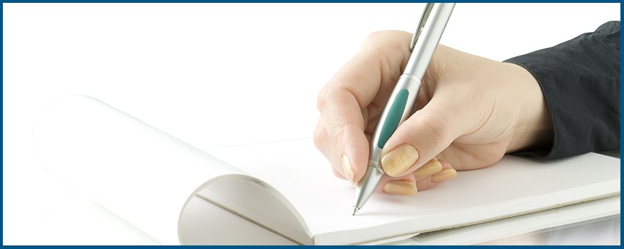 Hand writing on a notepad. Please make a selection