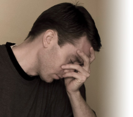Man with head in his hand.