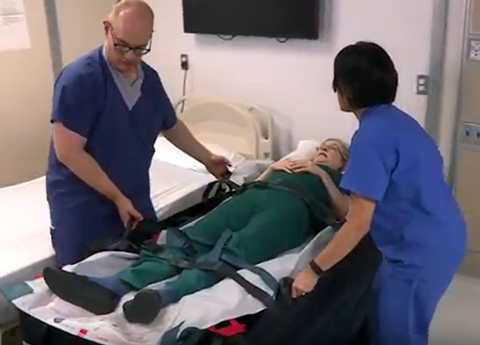 an air-assisted lift to manuever patient back into bed.